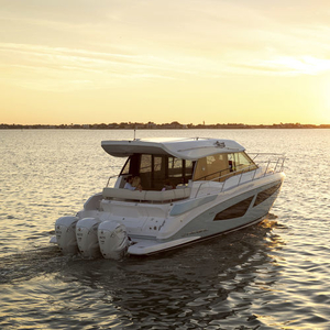 Outboard express cruiser - 42 XO - Regal - triple-engine / flybridge / with cabin