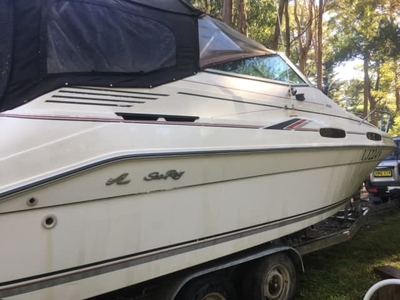 Boat cruiser Searay 230 on tandem trailer low hours, plus towable