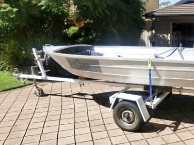 12 ft tinny, 15HP outboard &, trailer