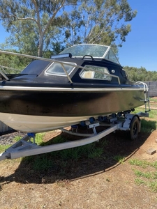 16ft Half cabin boat with Johnson 115 outboard motor
