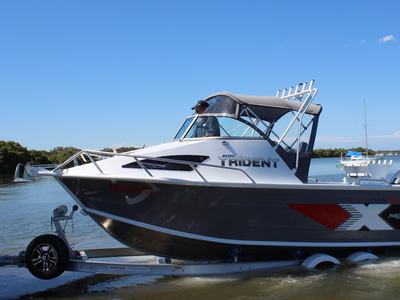 This New QUINTREX 610 TRIDENT SOFT TOP F130 HP Pack 1