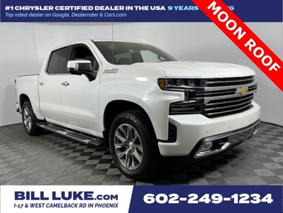 PRE-OWNED 2022 CHEVROLET SILVERADO 1500 LTD HIGH COUNTRY WITH NAVIGATION & 4WD