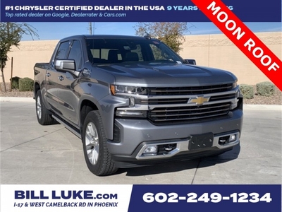 PRE-OWNED 2022 CHEVROLET SILVERADO 1500 LTD HIGH COUNTRY WITH NAVIGATION & 4WD