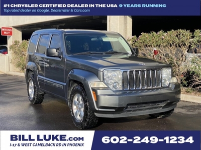 PRE-OWNED 2012 JEEP LIBERTY SPORT 4WD