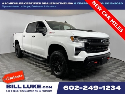 PRE-OWNED 2023 CHEVROLET SILVERADO 1500 LT TRAIL BOSS WITH NAVIGATION & 4WD