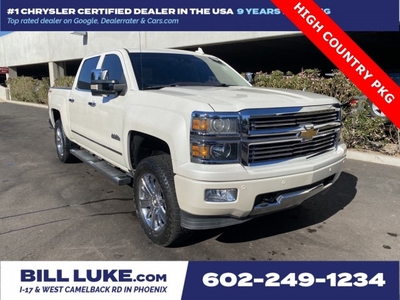 PRE-OWNED 2015 CHEVROLET SILVERADO 1500 HIGH COUNTRY WITH NAVIGATION & 4WD