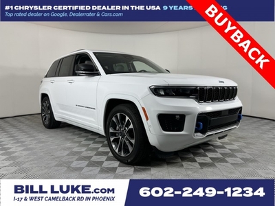 PRE-OWNED 2022 JEEP GRAND CHEROKEE OVERLAND 4XE WITH NAVIGATION & 4WD