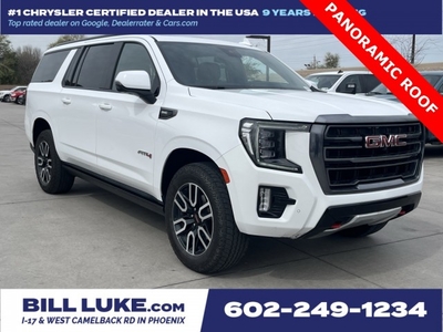 PRE-OWNED 2023 GMC YUKON XL AT4 WITH NAVIGATION & 4WD
