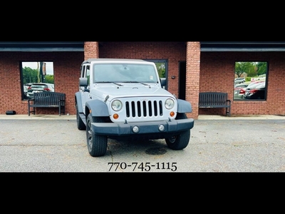 Used 2013 Jeep Wrangler Unlimited Sport