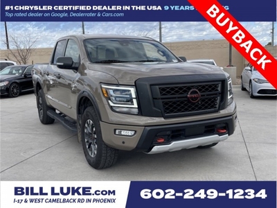 PRE-OWNED 2023 NISSAN TITAN PRO-4X WITH NAVIGATION & 4WD