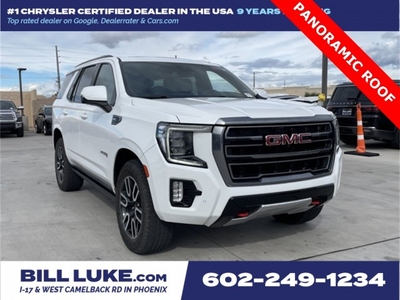 PRE-OWNED 2023 GMC YUKON AT4 WITH NAVIGATION & 4WD