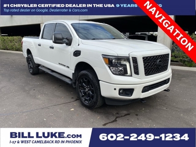 PRE-OWNED 2019 NISSAN TITAN XD SV WITH NAVIGATION & 4WD
