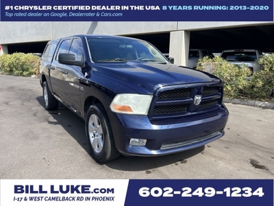 PRE-OWNED 2012 RAM 1500 ST