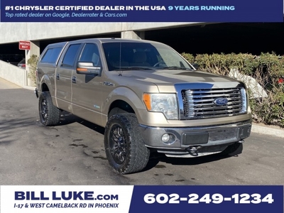PRE-OWNED 2011 FORD F-150 4WD