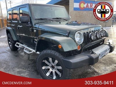 2012 Jeep Wrangler Unlimited Sahara Off-Road Adventure Awaits with 4WD and Low Miles! for sale in Denver, CO