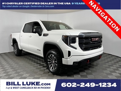 PRE-OWNED 2023 GMC SIERRA 1500 AT4 WITH NAVIGATION & 4WD