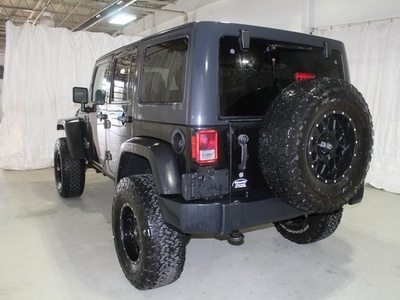 2014 Jeep Wrangler Unlimited Sport in Pinconning, MI