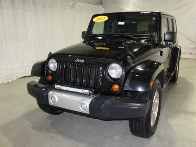2012 Jeep Wrangler Unlimited Sahara in Pinconning, MI