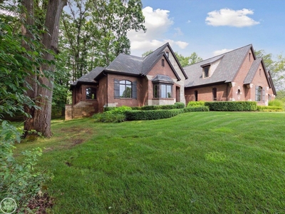 Custom Ranch On Two Private Wooded Acres