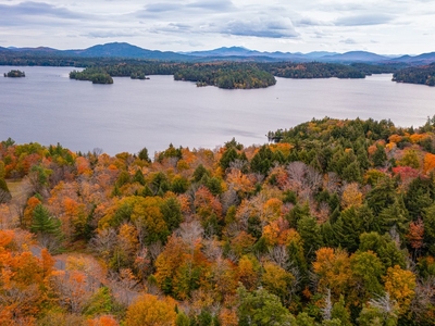 Upper Saranac Lake Waterfront Home With Breathtaking Views And Guest Cottage